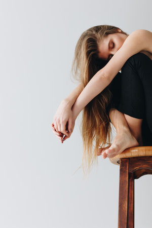 Topless young caucasian woman on white backgroundの写真素材