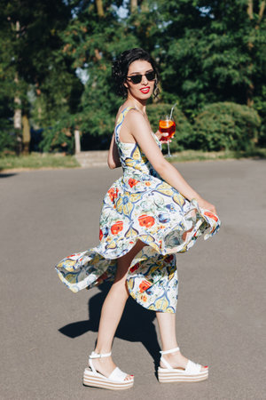 beautiful woman with cocktailの写真素材