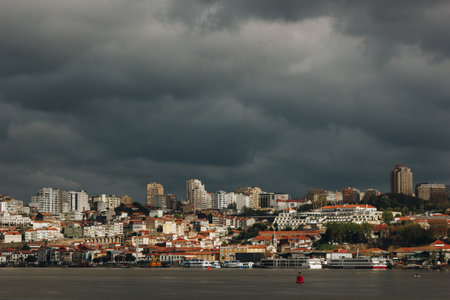 View of Porto across the Duoro river at sunset, Portugal