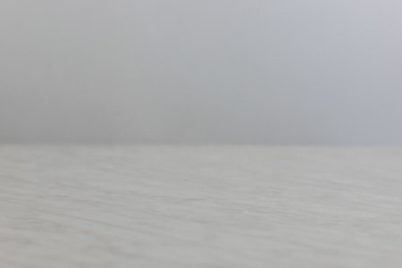 Marble stone table with grey background wallの写真素材