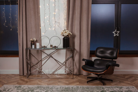 Modern interior with stylish leather chair and table with lamps