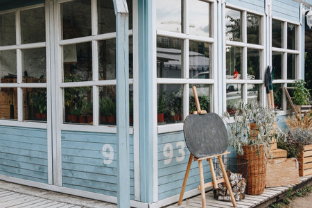 Little blue house in the gardenの写真素材