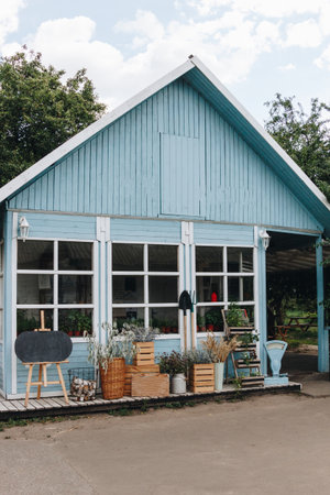 Little blue house in the gardenの写真素材