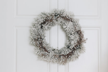 Christmas wreath on white wallの写真素材