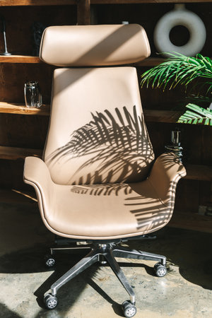 Modern interior with beige leather office chair