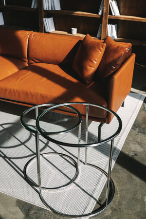 Coffee table and brown leather couch in the modern living room