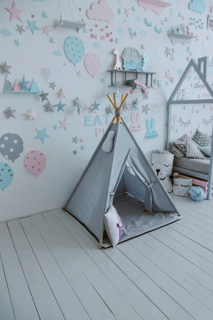 Modern children bedroom interior with wigwamの写真素材