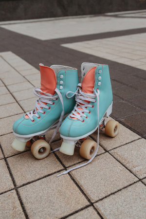 Close up photo of cute mint four wheeled roller bladesの写真素材