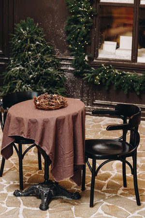 Cafe table with Christmas decorationの写真素材