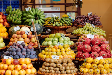Variety of fruit at the farmers market in Funchal, Madeira, Portugalの写真素材