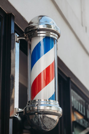 Barbershop pole with blue, red and white stripes