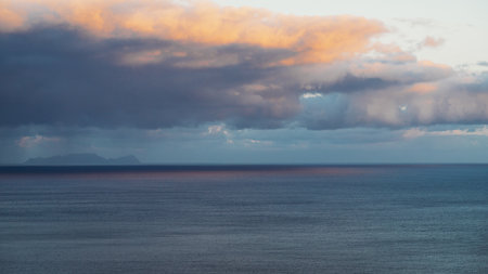 Sunrise over the Atlantic ocean in Funchal, Madeira island, Portugalの写真素材