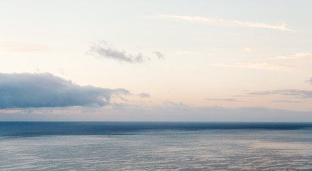 Sunset over the Atlantic ocean in Funchal, Madeira island, Portugalの写真素材
