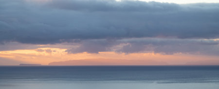 Sunrise over the Atlantic ocean in Funchal, Madeira island, Portugalの写真素材