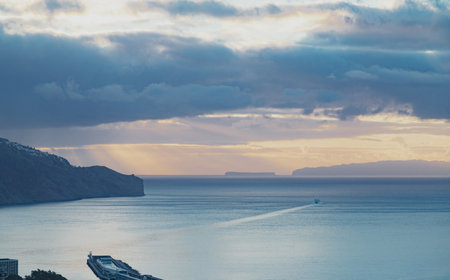 Sunrise over the Atlantic ocean in Funchal, Madeira island, Portugalの写真素材