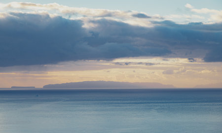 Sunrise over the Atlantic ocean in Funchal, Madeira island, Portugalの写真素材