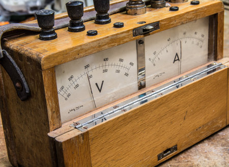 Vintage analog wooden electric meter on the old table testの写真素材