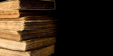Some ancient books on the table. Copyspaceの写真素材