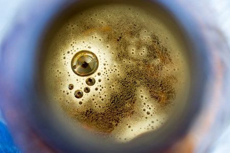 Beer bubbles in bottle neck.の写真素材