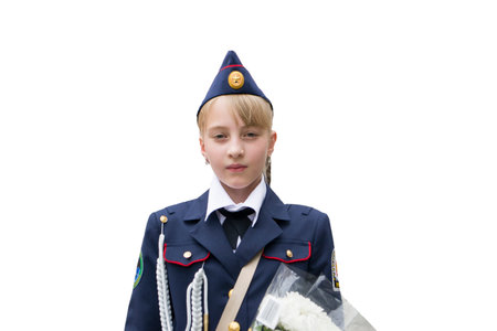 A girl in cadet uniform. Isolate.の写真素材