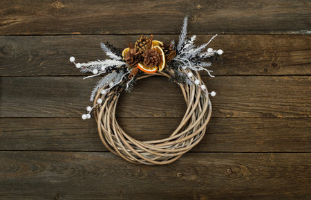 Christmas wreath with a vintage wooden backgroundの写真素材
