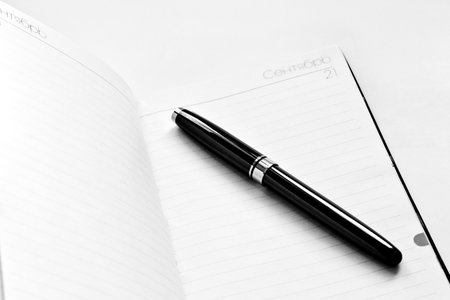 A notebook and pen for planning の写真素材