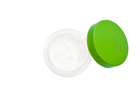 Tub with a beauty cream on a white background