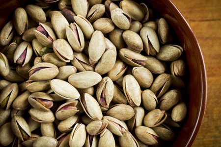 Pistachio nuts in a bowl closeup
