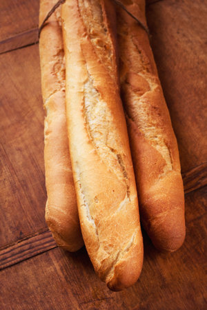 Fresh baguettes on the tableの写真素材
