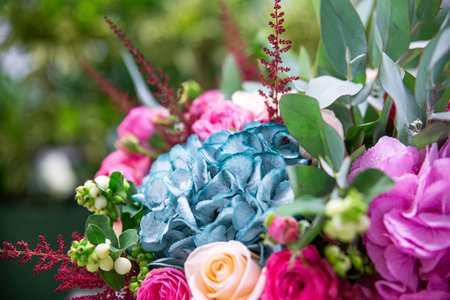 Beautiful bouquet from multi-colored flowers.  Motley background suitable for advertising layouts, banners, postcards.の写真素材
