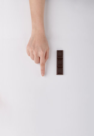 Hand and chocolateの写真素材