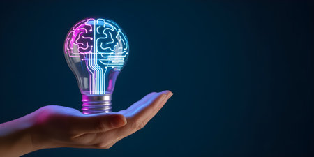 A glowing light bulb with a digital brain design symbolizes artificial intelligence, innovation, creativity, and futuristic technology in human hands.の素材