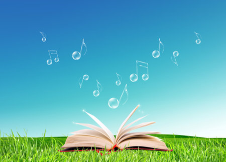 A nice book under a blue sky and notesの写真素材