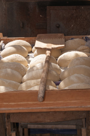 Artisan baker working in traditional fairの写真素材