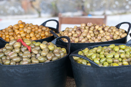 Assortment of olives in a marketの写真素材