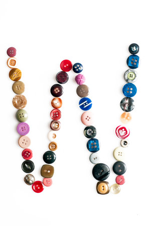 Serie of letters of the alphabet formed by buttonsの写真素材
