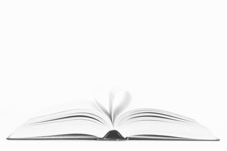 Book pages forming a heart
