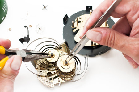 Clock disassembled for repair and calibration