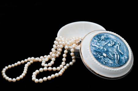 Detail of a porcelain box with a pearlの写真素材