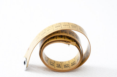 Detail of an old tape measure of tailoringの写真素材