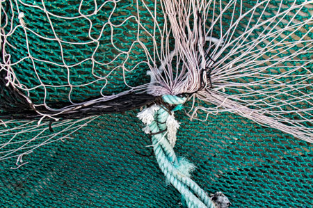 Detail of fishing nets to repairの写真素材