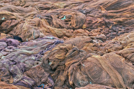 Detail of fishing nets to repairの写真素材