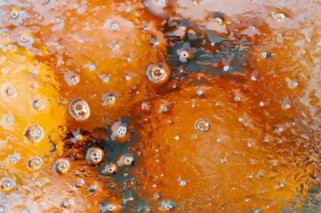 Detail of orange background with waterの写真素材