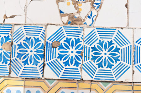 Detail of fireplace tiles and Antonio Gaudi