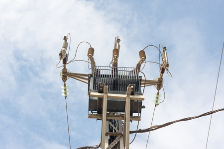 Electric pole with a transformerの写真素材