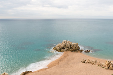 Details Roca Grossa beach of Calella in Catalonia (Spain)