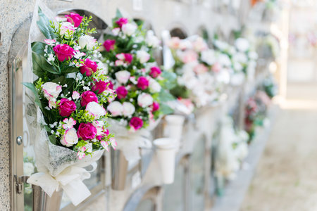 Detail of a bouquet of flowers in a cemeteryの写真素材