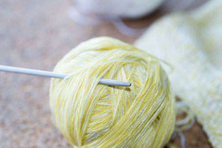 Details and wool Knitting needles
