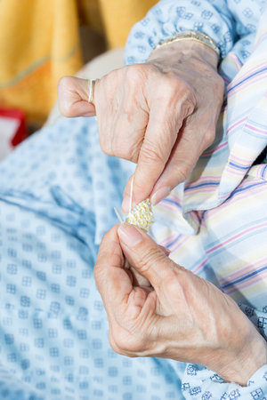 Nursing home. Detail of a woman's hands