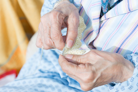 Nursing home. Detail of a woman's handsの写真素材